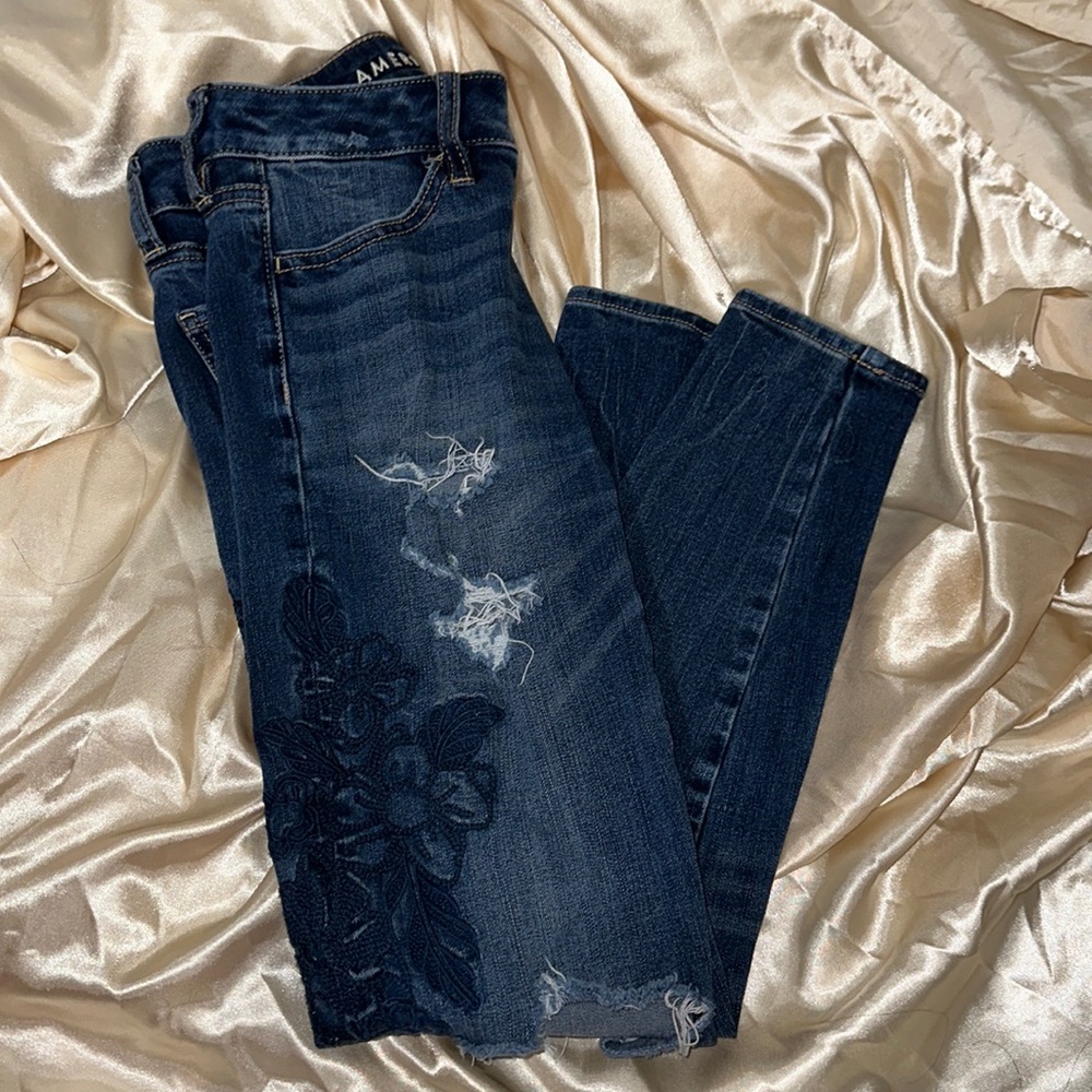 Floral ripped American Eagle skinny jeans
